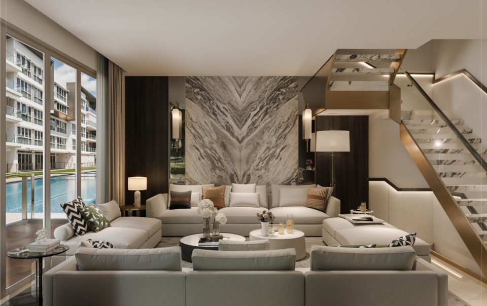 Modern living room at Euhabitat with bookmatched marble feature wall and pool-facing glazing
